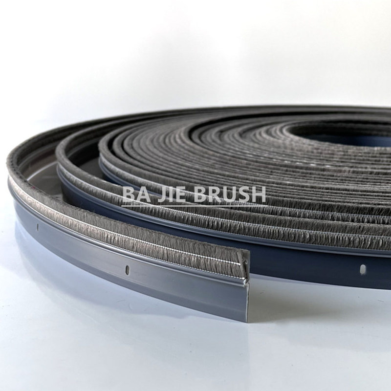 Rotary heat exchanger seal brush for energy recovery wheels