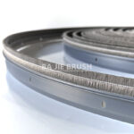 Thermal wheel seal brush with flexible PVC profile