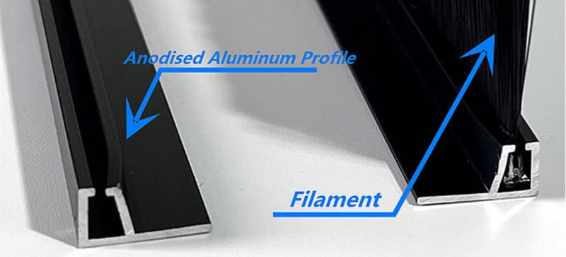 Cross-section showing the black anodised aluminum profile and synthetic filaments of a door seal strip brush