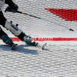 Artificial dry ski slope surface made from PBT strip brush mats