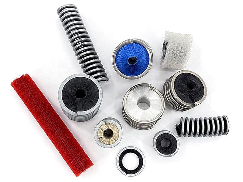 Assorted spiral strip brushes with different bristle materials and configurations