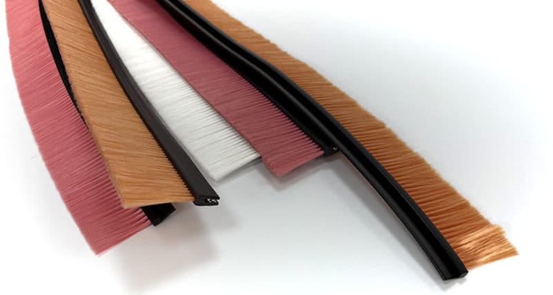 Custom TPE Strip Brush Profiles Flexible strip brushes with different colored TPE profiles and nylon bristles