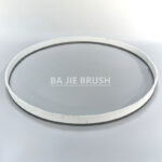 Metal channel strip brush formed into a circular cup shape