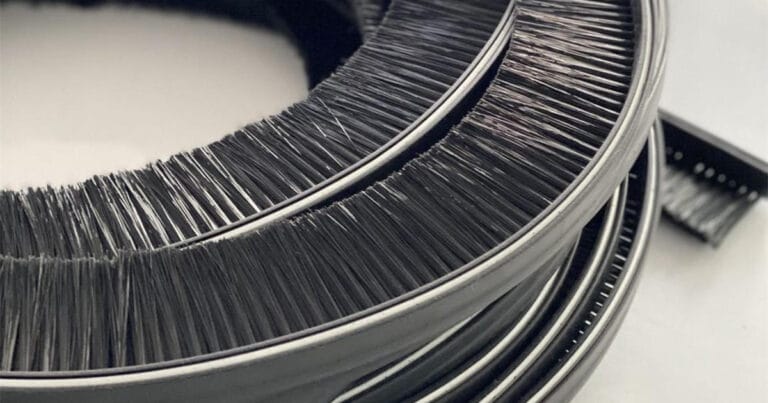 High-density flexible strip brush supplied in coils with dense black bristles