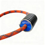 Coil brush with inward-facing bristles for rope cleaning