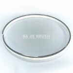 Round surface cleaner brush with nylon bristles and stainless steel support ring