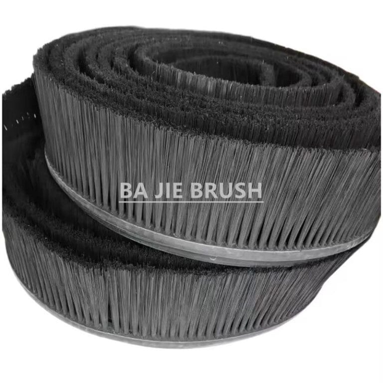 Rolled flexible spray suppressant brush strip for a truck mudguard