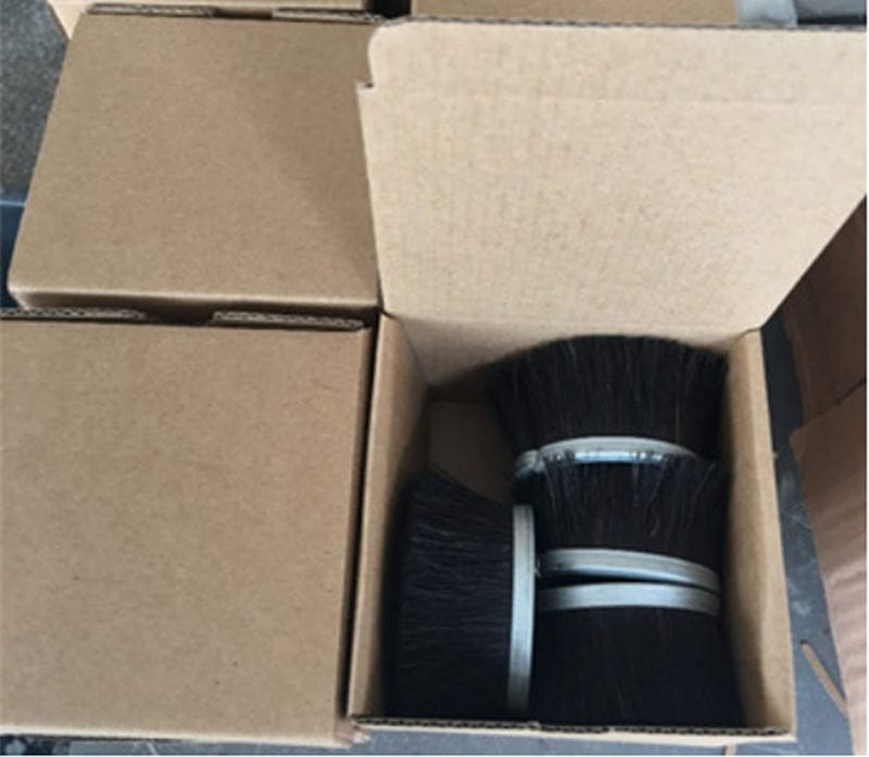 Formed vacuum nozzle brush strips packed in individual cardboard boxes