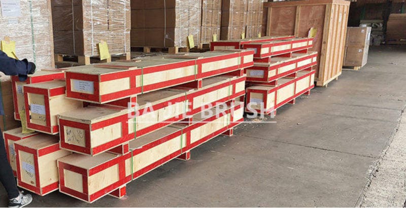 Reinforced wooden crates prepared for transporting long strip brushes