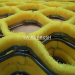 Yellow PBT bristle mat for artificial ski slopes