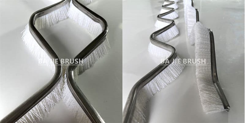 Curved PBT metal channel strip brushes used to manufacture dry ski slope material